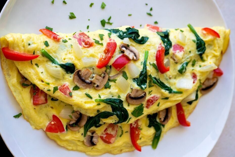 A protein-rich omelette packed with onions, tomatoes, capsicum, and herbs. Quick to prepare and ideal for a healthy morning meal.